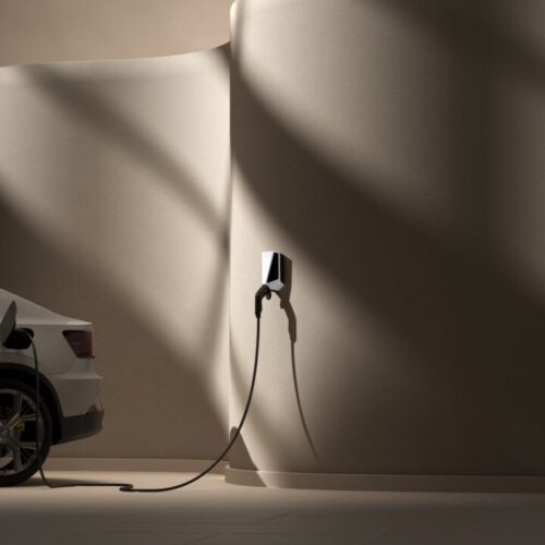 AN EV PLUGGED INTO AN EV CHARGER